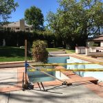 A pool that has been cleaned and is being worked on.